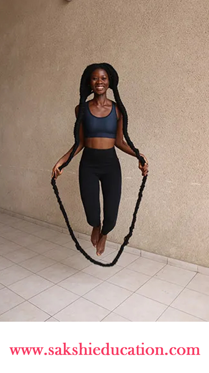 Most skips over a person’s own hair in 30 seconds :  Laetitia (Abidjan, Ivory Coast)